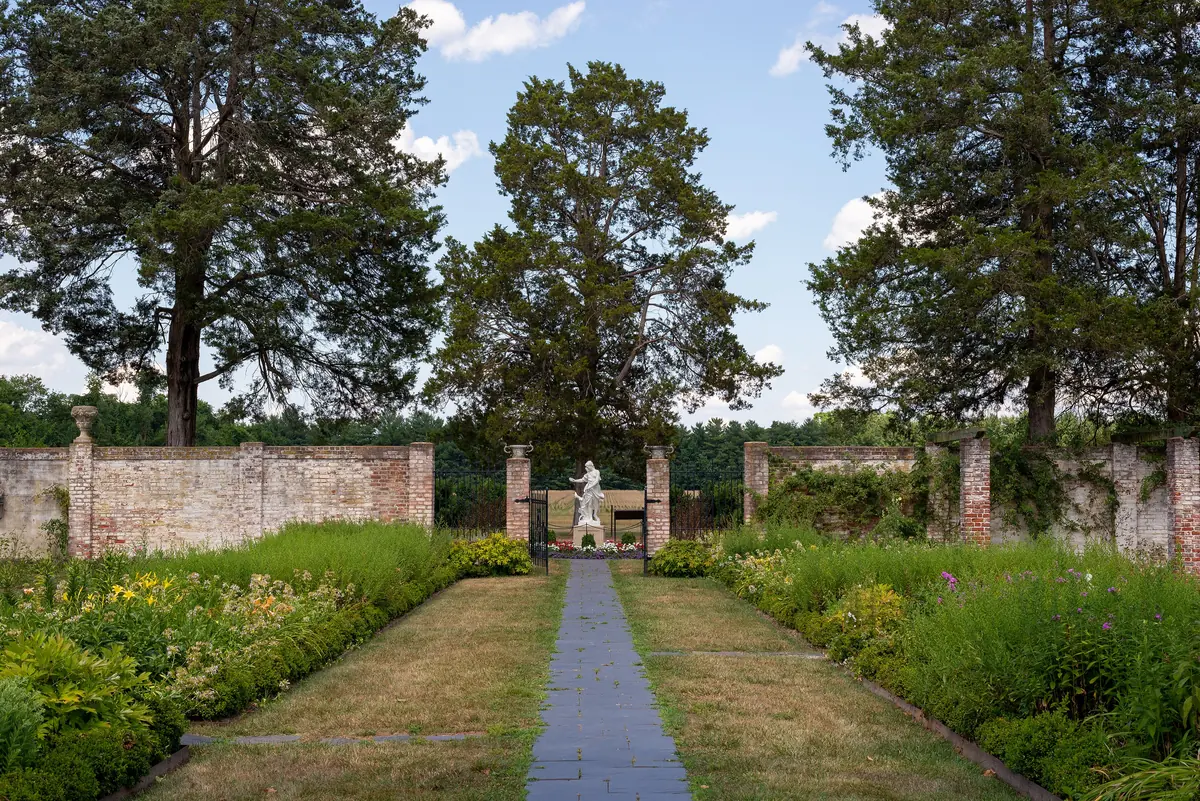 The walkway to the Diana statue in the gardens at Chatham